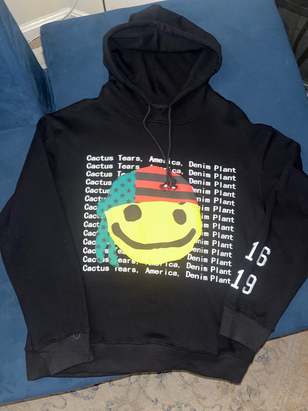 Cactus Plant Flea Market Black Hoodie with Yellow Smiley & American-Flag Bandana